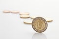 Irish and euro coins on white background