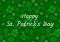 Irish Feast of St. Patrick Day greeting card or invitation. A lot of clover leaves scattered on a green background. Vector flat st