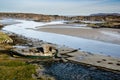 Abandon Fishing boat on the Sand at low tide Royalty Free Stock Photo