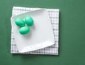 Irish Green Hard Boiled Eggs on White and Green Backgrounds