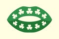 Irish kiss. Green lips with shamrock. Vector Royalty Free Stock Photo