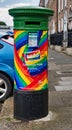Irish post box or letter box decorated in the pride colours downtown Dublin Ireland