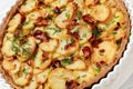 Irish potato pie with bacon in baking dish