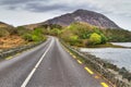 Irish road with mountain view Royalty Free Stock Photo