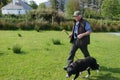 Irish Shepherd and his sheepherding dog. Royalty Free Stock Photo