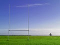 Irish sport tall goal posts in a field on a bright sunny day. Galway city, Ireland. South park. Camogie, hurling and rugby