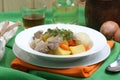 irish stew in a white bowl
