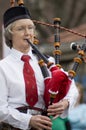 Irish Woman Playing Bagpipes