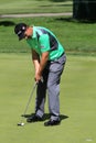 Irishman Padraig Harrington putting on the tour