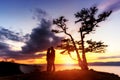 Irkutsk region, Russia - September 16, 2017: Tree and couple silhouette in Olkhon island with beautiful sky and clouds