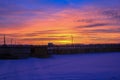 An electric pole in the village against the sunset. Royalty Free Stock Photo