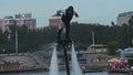 Irkutsk, Russia - August 3 2019: Baikal Jet Fest, BJF. Man posing at water extreme sport flyboard. Fly board, surfing