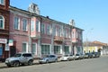 Irkutsk, Russia, March, 16, 2017. Cars on Karl Marx street in Irkutsk in the spring, the house 41. Pre-revolutionary architecture
