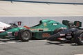 IRL open wheel racing cars lined up on pit row Royalty Free Stock Photo