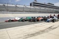 IRL open wheel racing cars on pit row Royalty Free Stock Photo