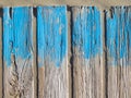 Iron with aged paint of different colors and rust and two rusty nuts