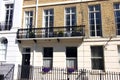 Iron balcony on Georgian terrace house, Brighton, Sussex, England