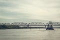 Iron barge and pusher tug boat on River. Large cargo barge transporting iron to main harbor for exporting along river. Royalty Free Stock Photo