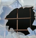 Iron bars and broken glass window
