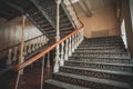 Iron beautiful vintage stairs in the old mansion. Ornate handrail of wrought iron