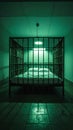 Iron bed frame resembling prison cell in eerie green room with bright light Royalty Free Stock Photo