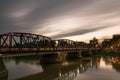 Iron bridge across river Royalty Free Stock Photo