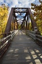 Iron bridge carries the Farmington River Trail in Canton, Connecticut. Royalty Free Stock Photo