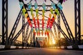 Iron Bridge and colorful light lantern in sunrise. Loi Krathong or Yi Peng Festival in Chiang Mai, Thailand Royalty Free Stock Photo