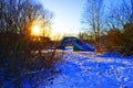 The iron bridge over the icy lake Royalty Free Stock Photo