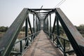 Iron bridge over the river in Sukhothai province Royalty Free Stock Photo