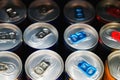 Iron cans with soda, energy or beer or cap. Close-up