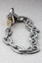Iron chain lock key on rock