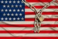 Iron chain and lock on usa silk national flag with beautiful folds, the concept of a ban on tourism, political repression, crime,
