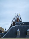 Iron chimney design on roof of an old house in The Hague