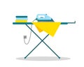 Iron and clothes on an ironing board. Royalty Free Stock Photo