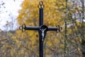 Iron cross on a stone pedestal