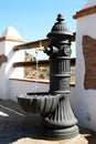 Iron drinking fountain, Almogia. Royalty Free Stock Photo