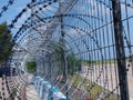 Iron fence at the airport to prevent people from breaking onto the runway Royalty Free Stock Photo