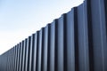 Iron fence and blue sky. Royalty Free Stock Photo