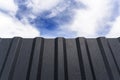 Iron fence and blue sky. Royalty Free Stock Photo