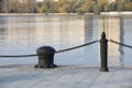 Iron fence near the water. Royalty Free Stock Photo