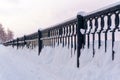 Iron fence of the winter quay Royalty Free Stock Photo