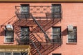 Iron fire ladder at the facade of an old historic house in New York