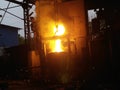 iron flowing in steelworks. Industrial details of metallurgic factory or plant. Details of smelting metal