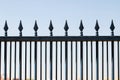 iron forged fence over a blue sky Royalty Free Stock Photo