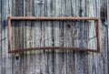 Iron frame on barn wood background Royalty Free Stock Photo