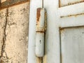 Iron garage doors. Rusty door. Door hinges. Close up shot Royalty Free Stock Photo