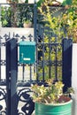 Iron gate with mailbox Royalty Free Stock Photo