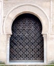 Iron gate with patterns arabic motifs of the famous Mezquita, Mosque-Cathedral of Cordoba, Spain Royalty Free Stock Photo