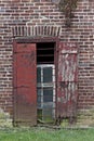 Iron glass wood brick window. Vertical.